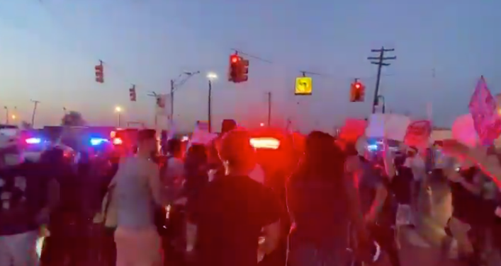 WATCH: Detroit Police Officer Drives Through BLM Protesters